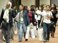 Dole hastens aid to OFWs