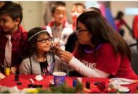 Panda Cares holds 8th annual holiday carnival celebration